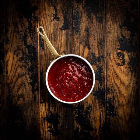 a close up of a cup with a spoon in it