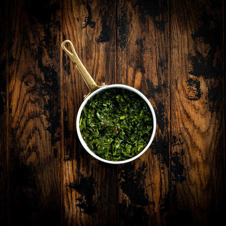 a close up of a bowl of food on a table