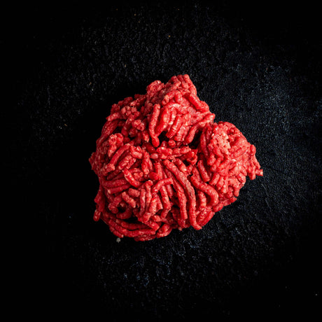 a picture of a red rose on a black background