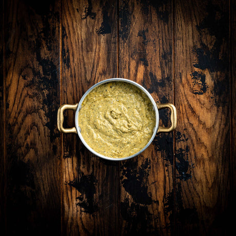 a close up of a bowl of food on a table