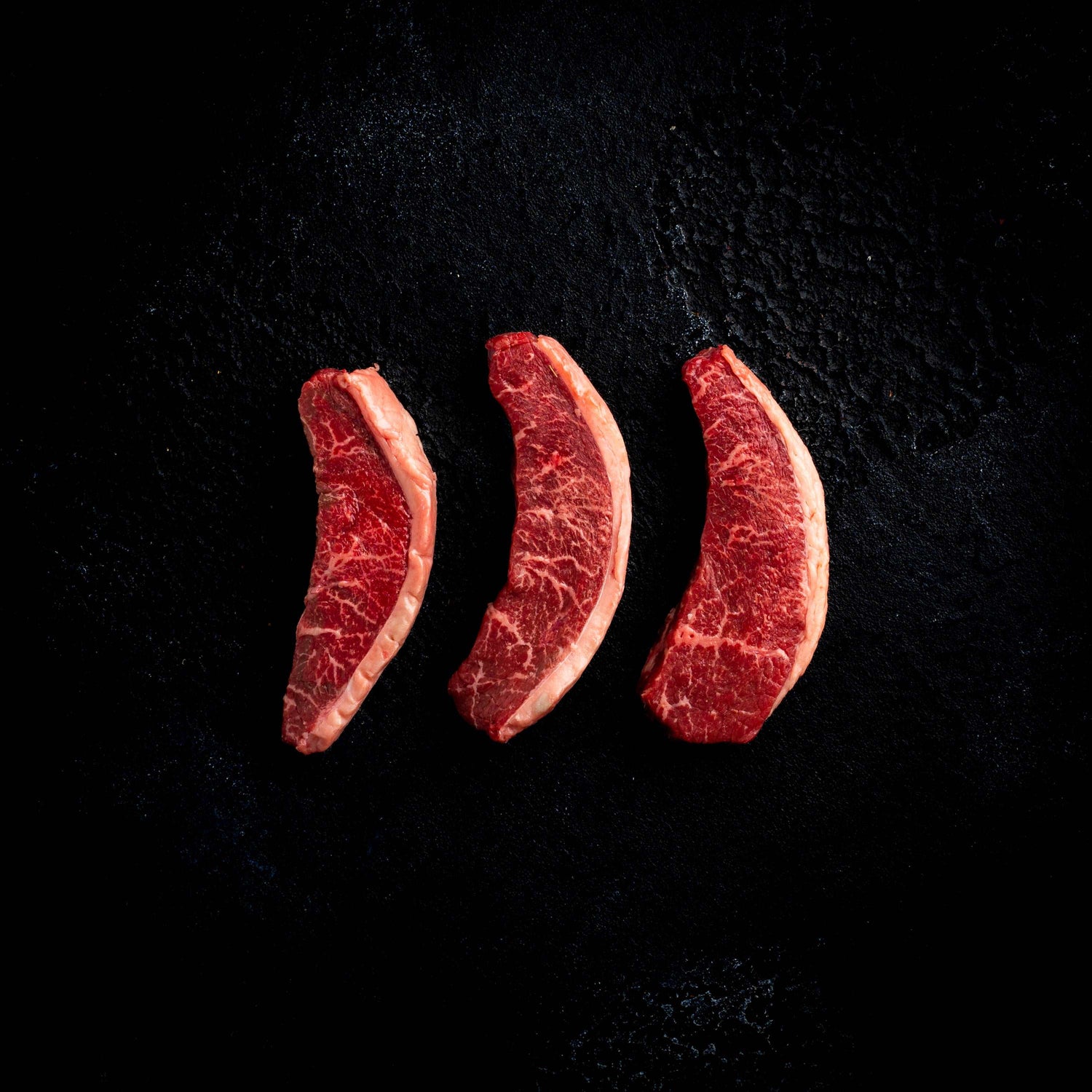 a close up of a row of hot dogs