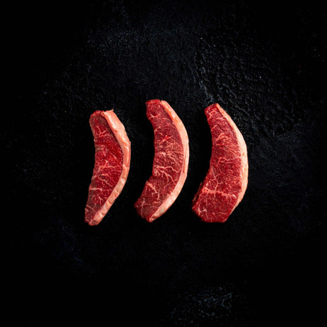 a close up of a row of hot dogs