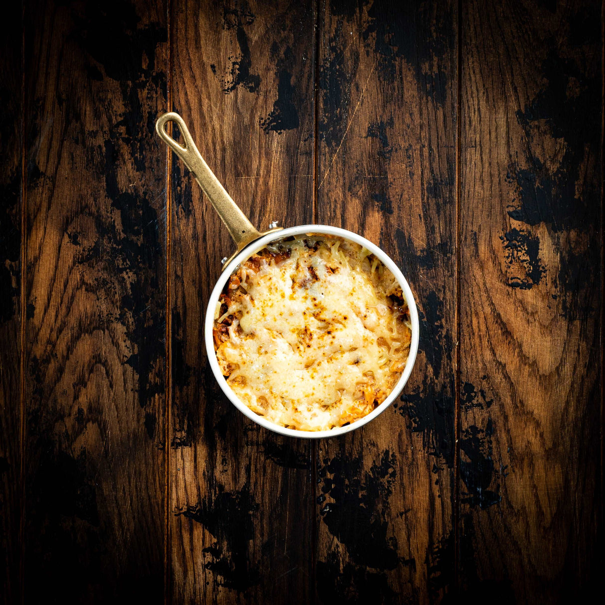 a close up of a bowl of food on a table