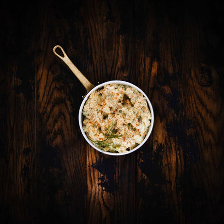 a bowl of soup and a spoon in a bowl