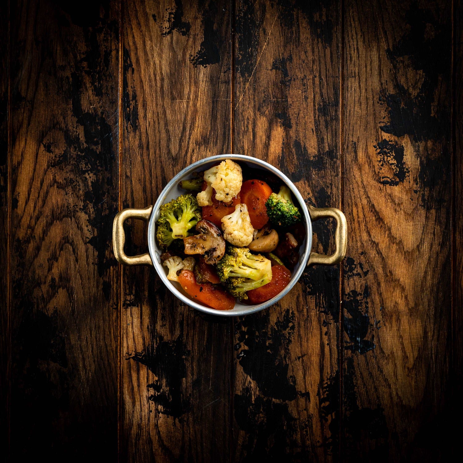 a close up of a bowl of food on a table