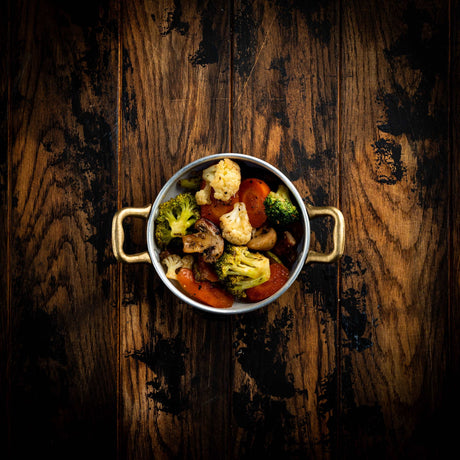 a close up of a bowl of food on a table