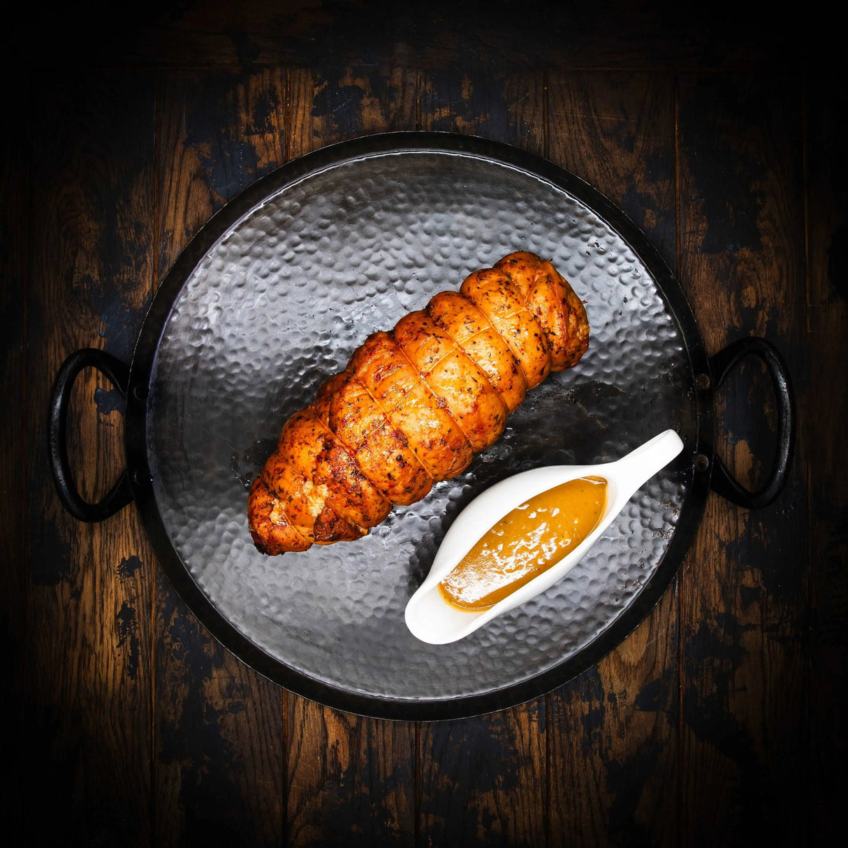 a close up of a hot dog on a plate