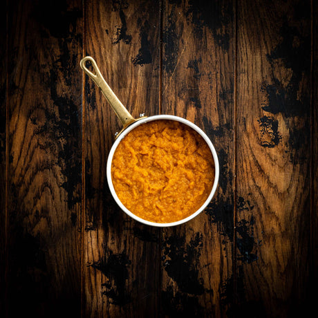 a close up of a bowl of food on a table