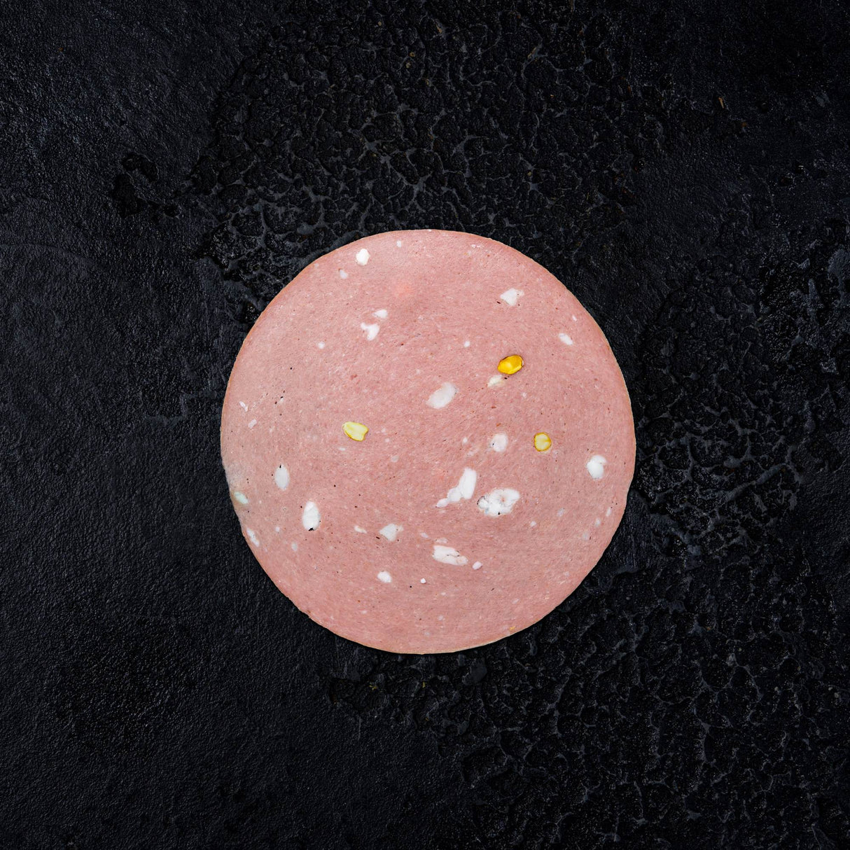 Mortadella Pistachio sliced close-up