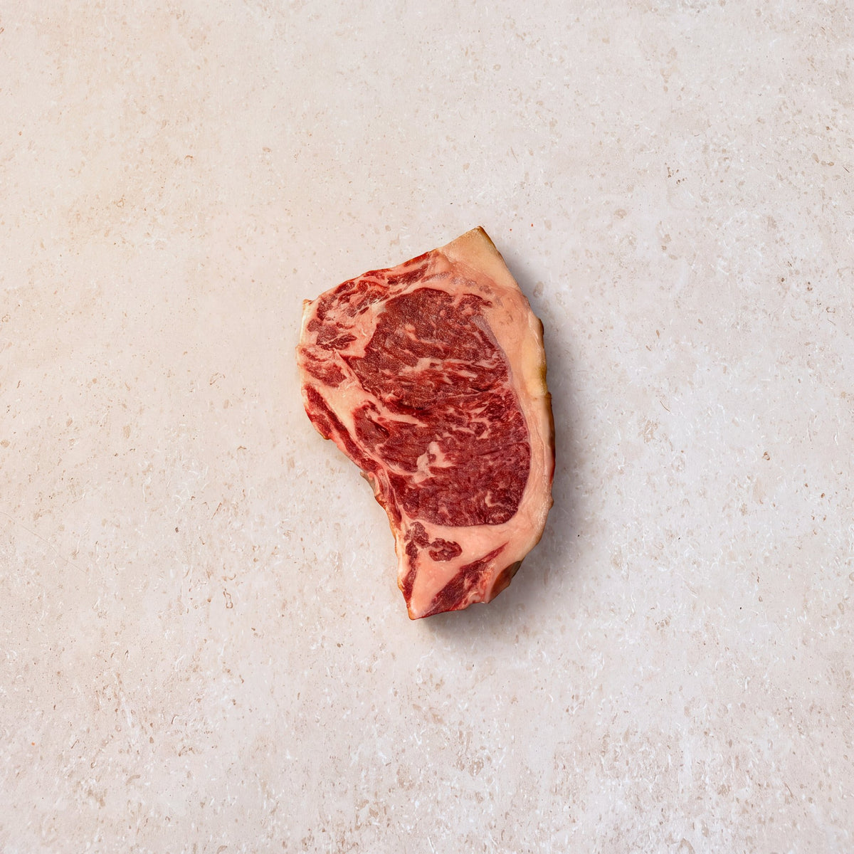 Dry-aged Bone In Striploin - 500-550g | CarniStore Dubai