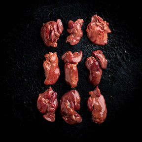 a group of teddy bears sitting on a black background 