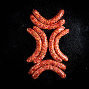 a close up of a carrot on a black surface 