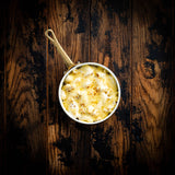 a close up of a bowl of food on a table 