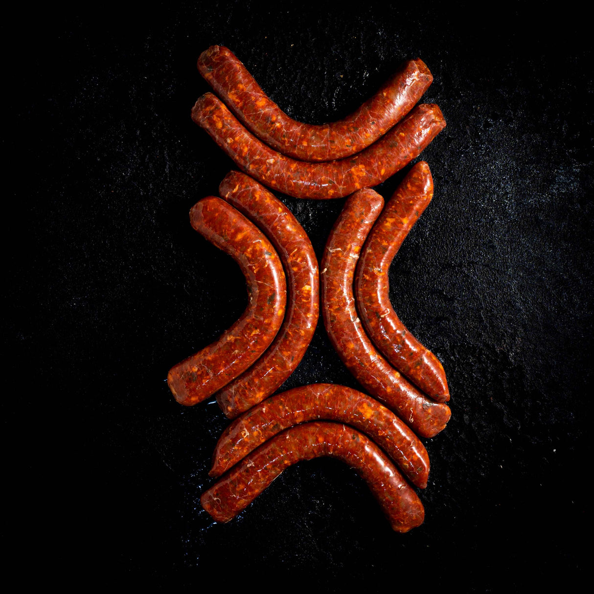 a close up of a pair of orange scissors 