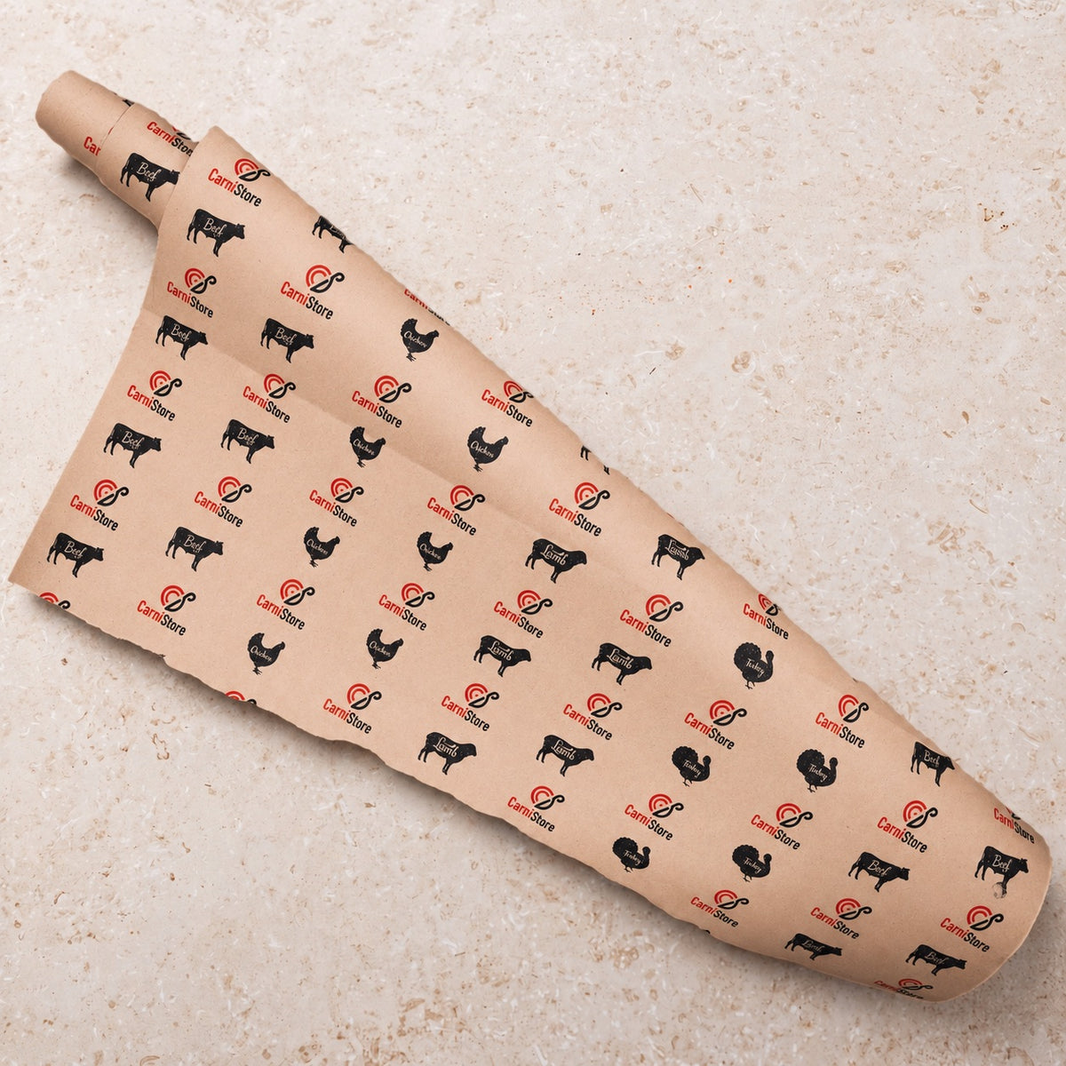 CarniStore butcher paper partially unrolled, with red and black logos and animal illustrations.